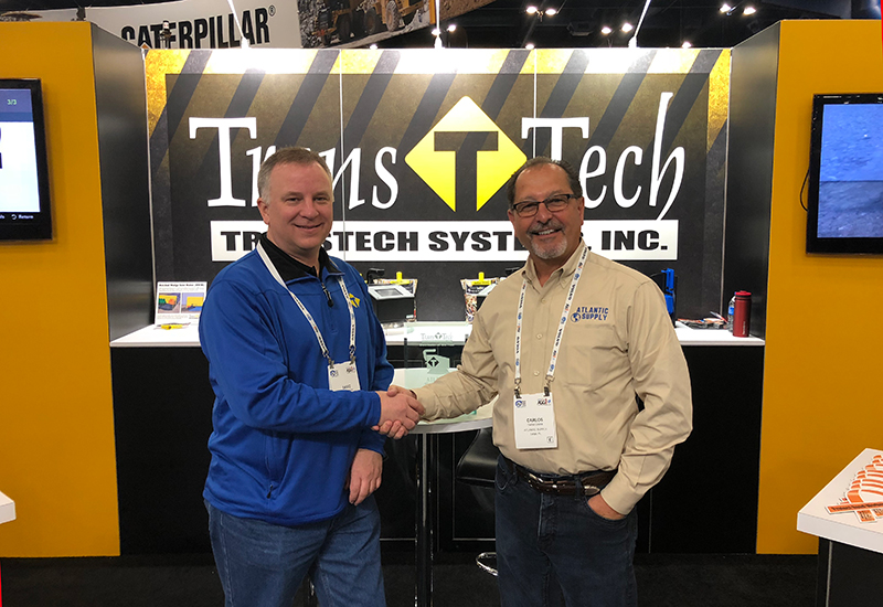 Atlantic Supply accepting TransTech Systems distributor of the year award